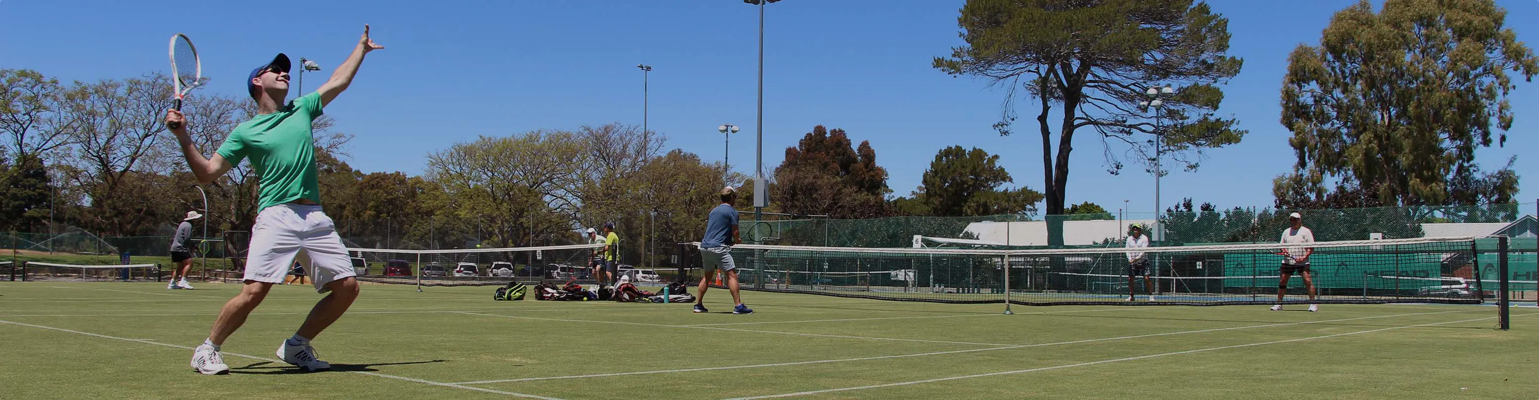 Adult tennis match at OPTC